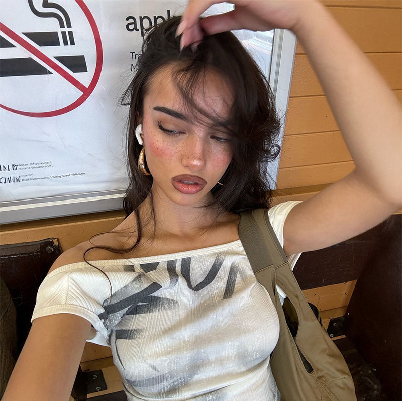 Hajra Off-Shoulder Graphic Tee